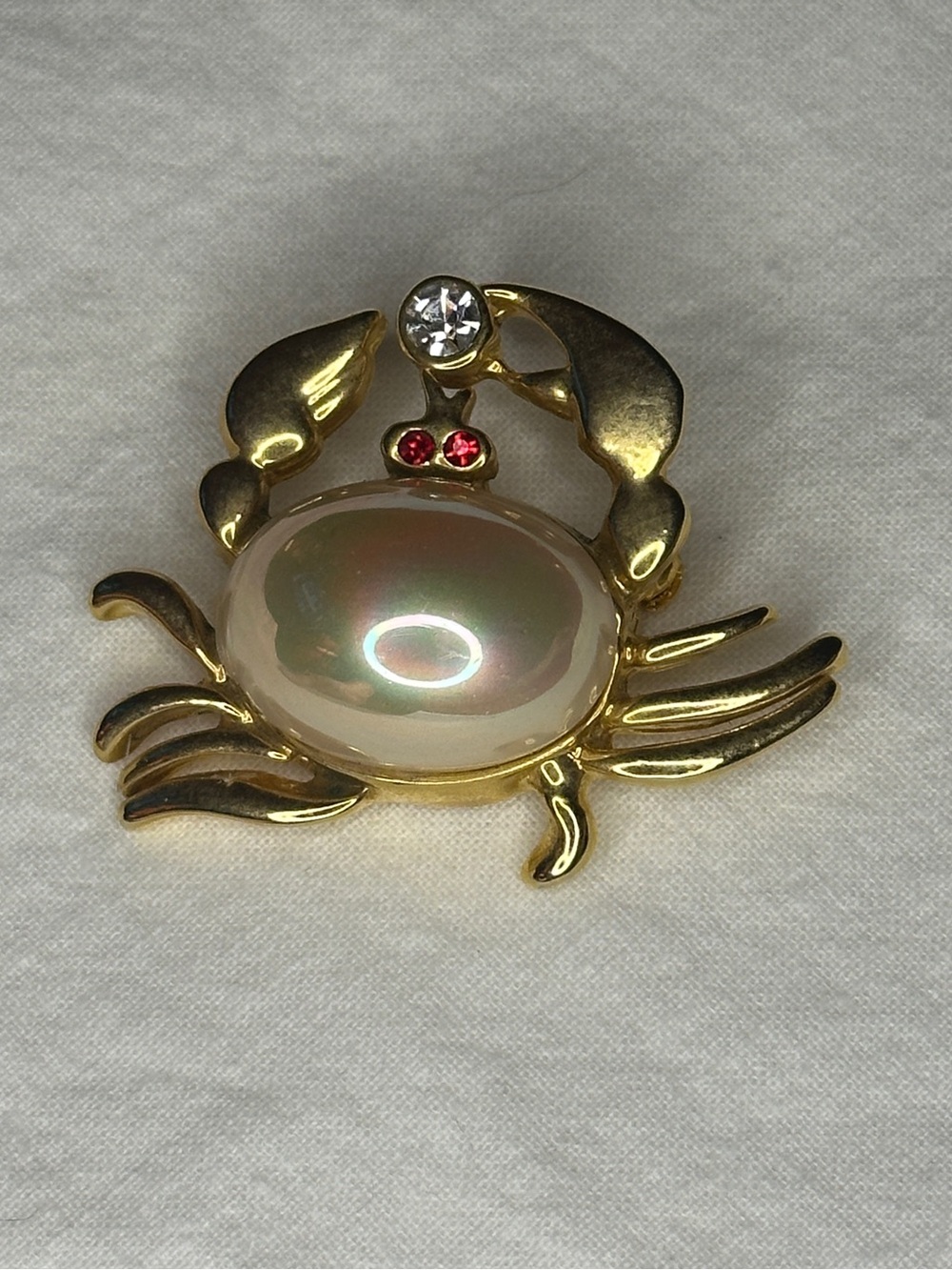 Crab Brooch Gold Toned with Iridescent Pearl and Red Stone Eye Accents